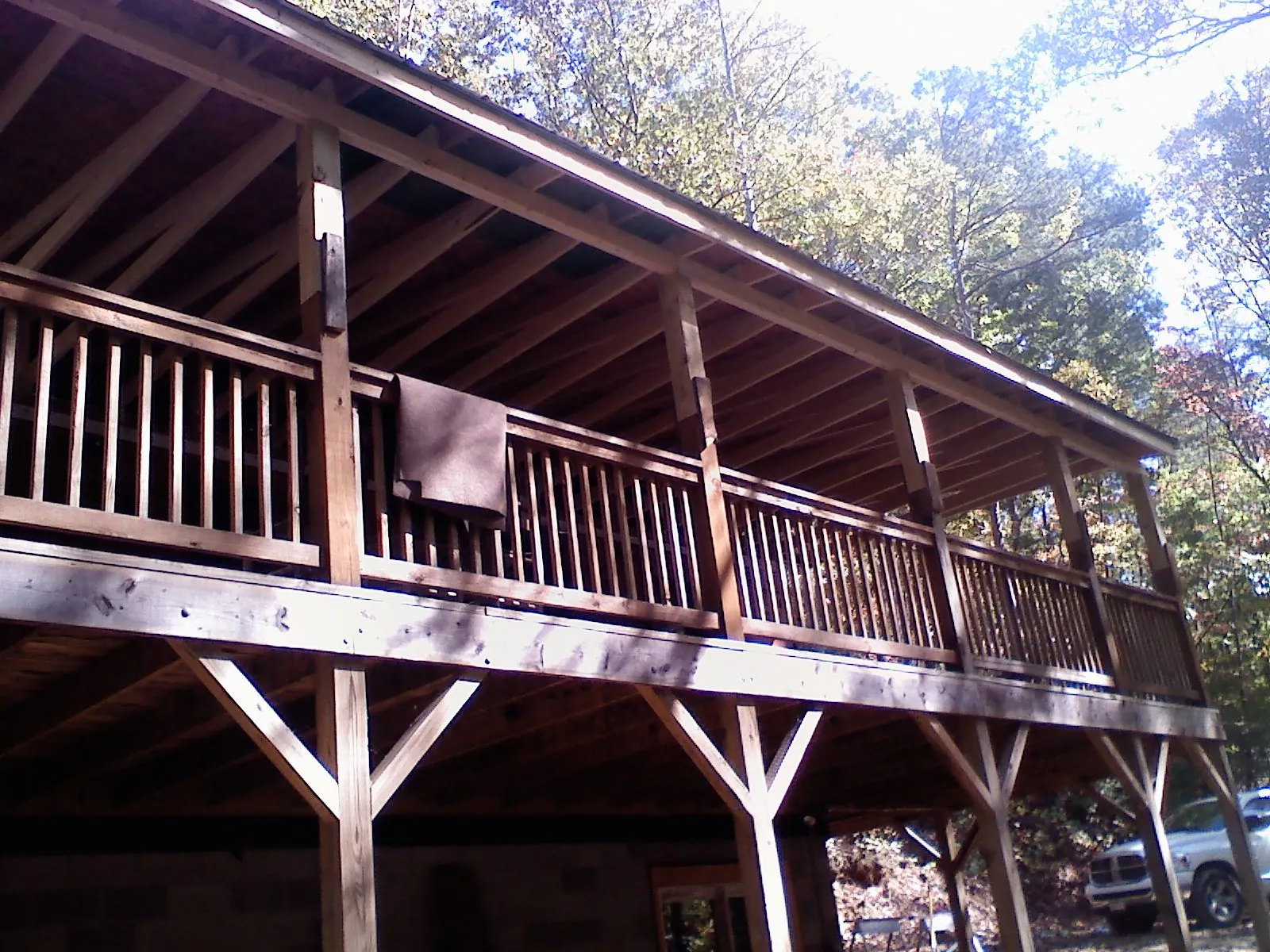 Timber framing under a new elevated porch and deck — Roof Leak Repair in Ogema by Roofing Brothers